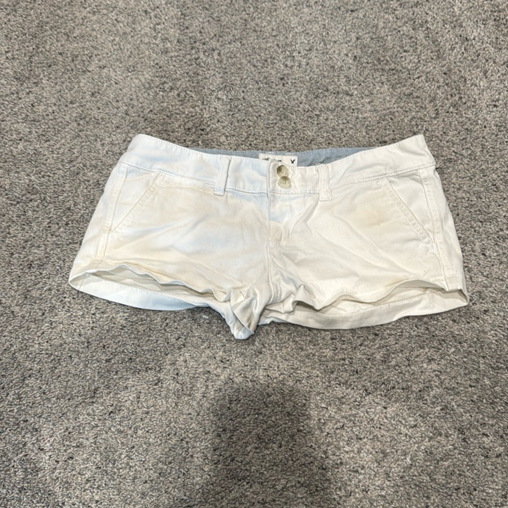 White shorts
Low rise
